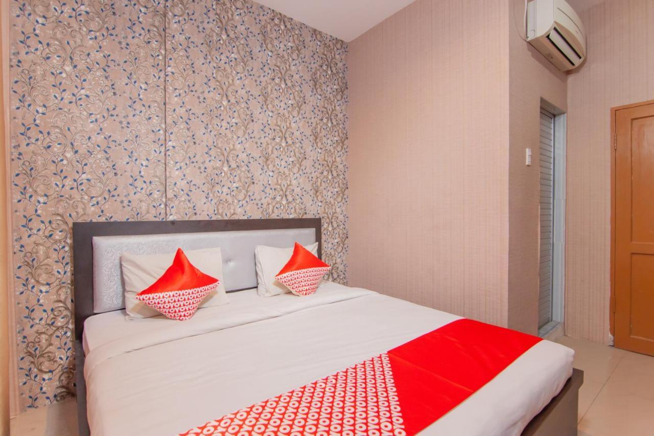 โอโย 2310 เรสซิเดนซ์ 68 Hotel เปอมาตังเสียนตาร์ ภายนอก รูปภาพ